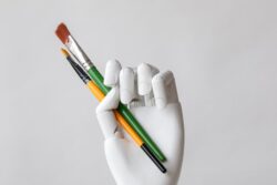 AI robot uses paintbrush to create logo
